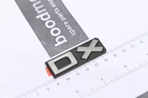 EMBLEM ‘DX’
